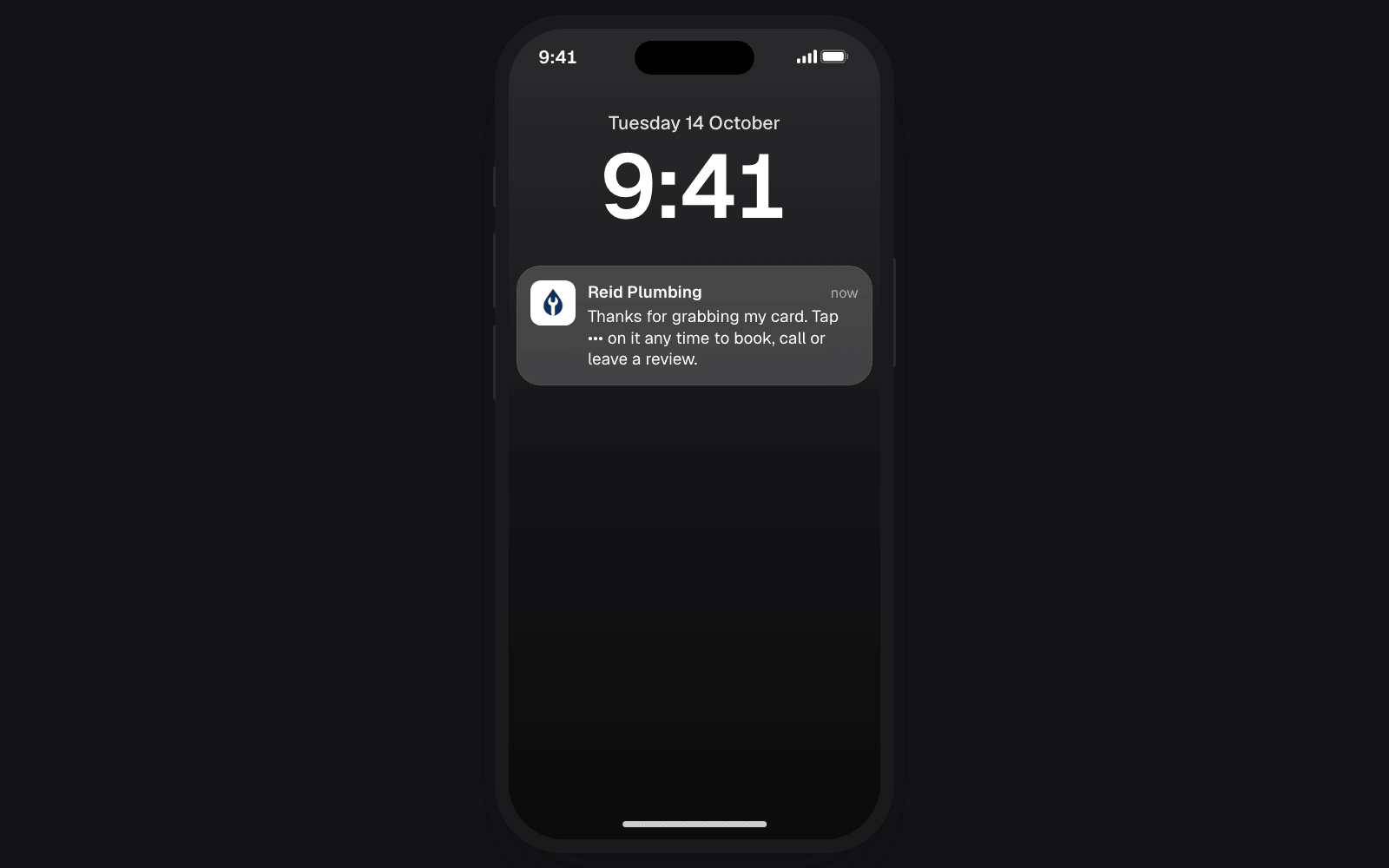An iPhone lock screen the morning after a card was saved, showing a thank-you notification from Reid Plumbing with its logo