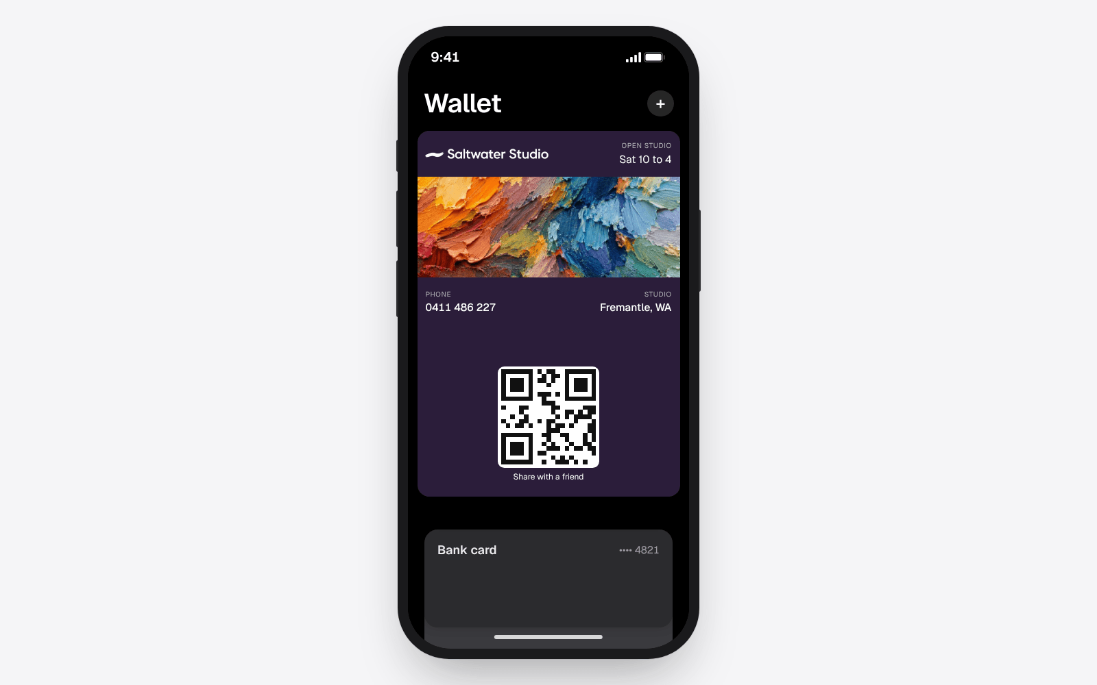 Saltwater Studio's business card saved in Apple Wallet on an iPhone, next to the other cards in the Wallet app